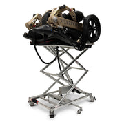 ComfyGO GO-Lift portable wheelchair and scooter lift, raised with a folded power wheelchair on the platform, angled view