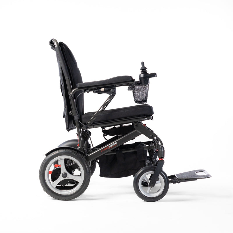 Travel Buggy DASH 3 folding electric wheelchair, right side view showing footrest and joystick