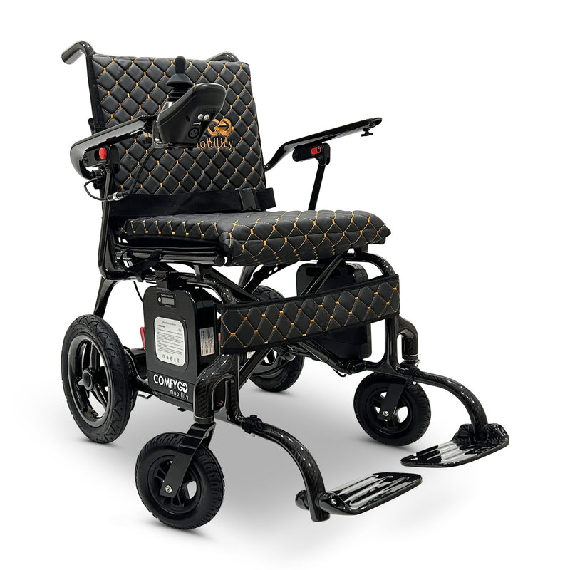 ComfyGo Phoenix carbon fiber folding electric wheelchair, black quilted textile cushion, front three-quarter view