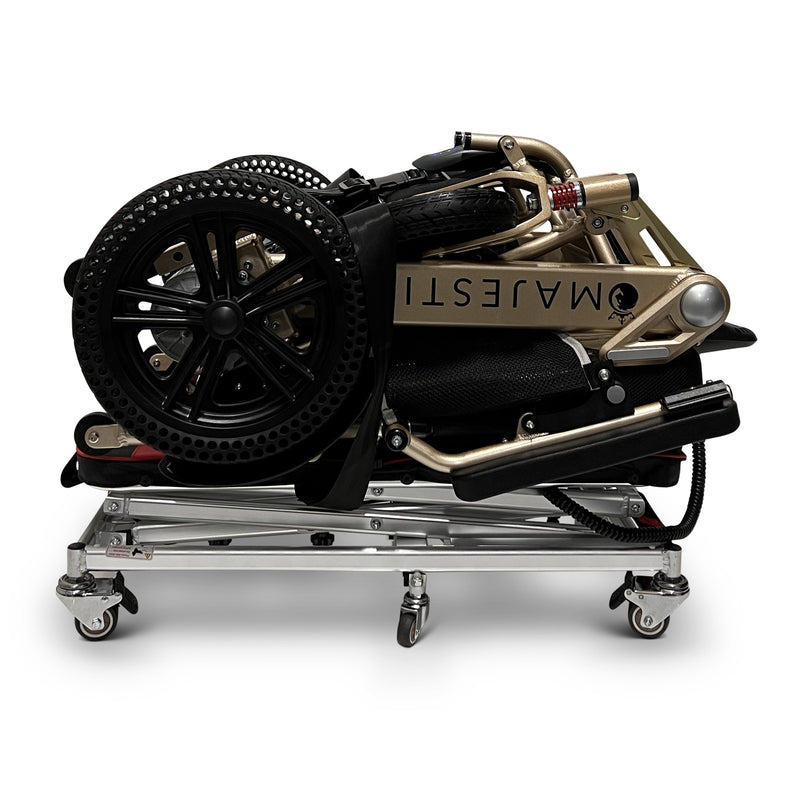 ComfyGO GO-Lift portable lift lowered with a folded power wheelchair on the platform