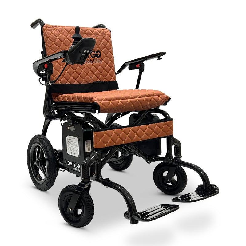ComfyGo Phoenix carbon fiber folding electric wheelchair, taba quilted textile cushion, front three-quarter view