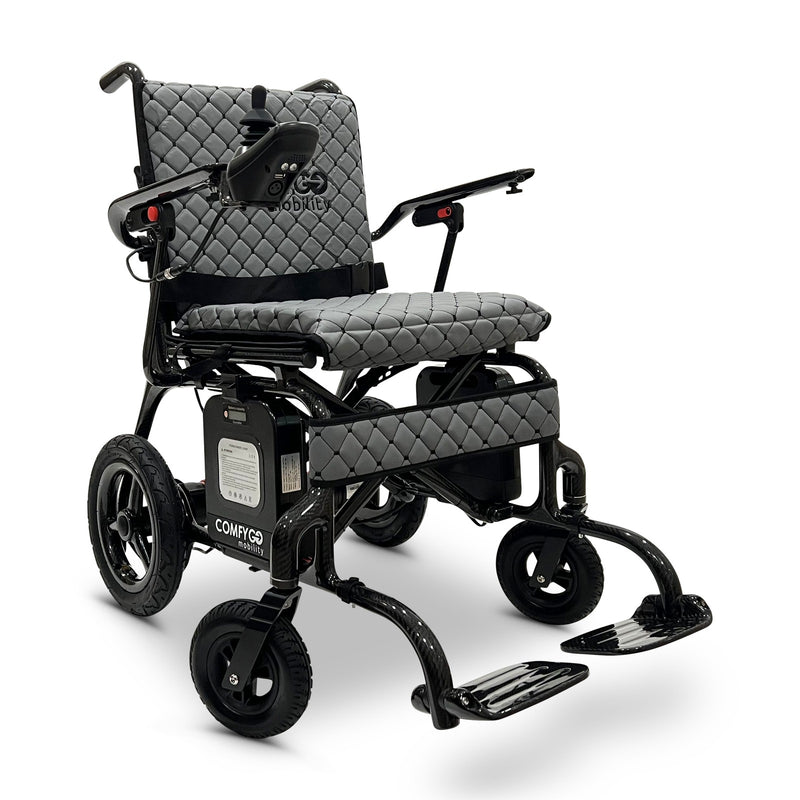 ComfyGo Phoenix carbon fiber folding electric wheelchair, gray quilted textile cushion, front three-quarter view
