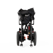 Travel Buggy Aerolux 2C power chair folded and standing upright, rear view