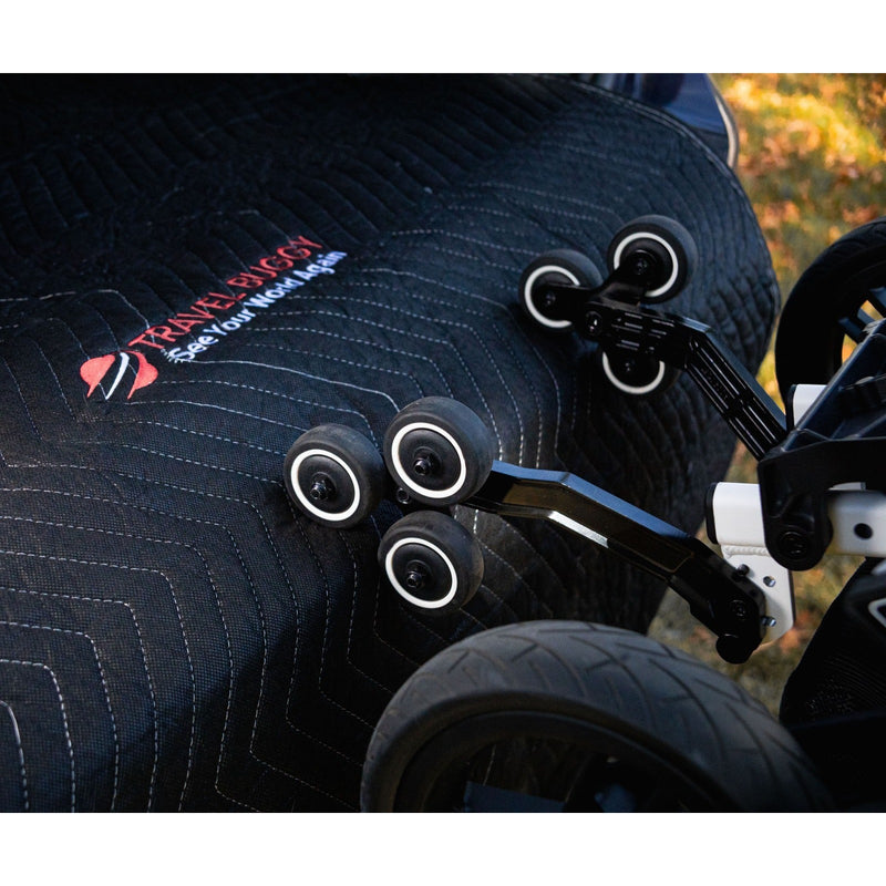 Grand Tourer built-in loading wheels resting on a vehicle moving blanket