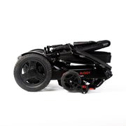 Travel Buggy City 2 Plus power chair, black, folded for transport