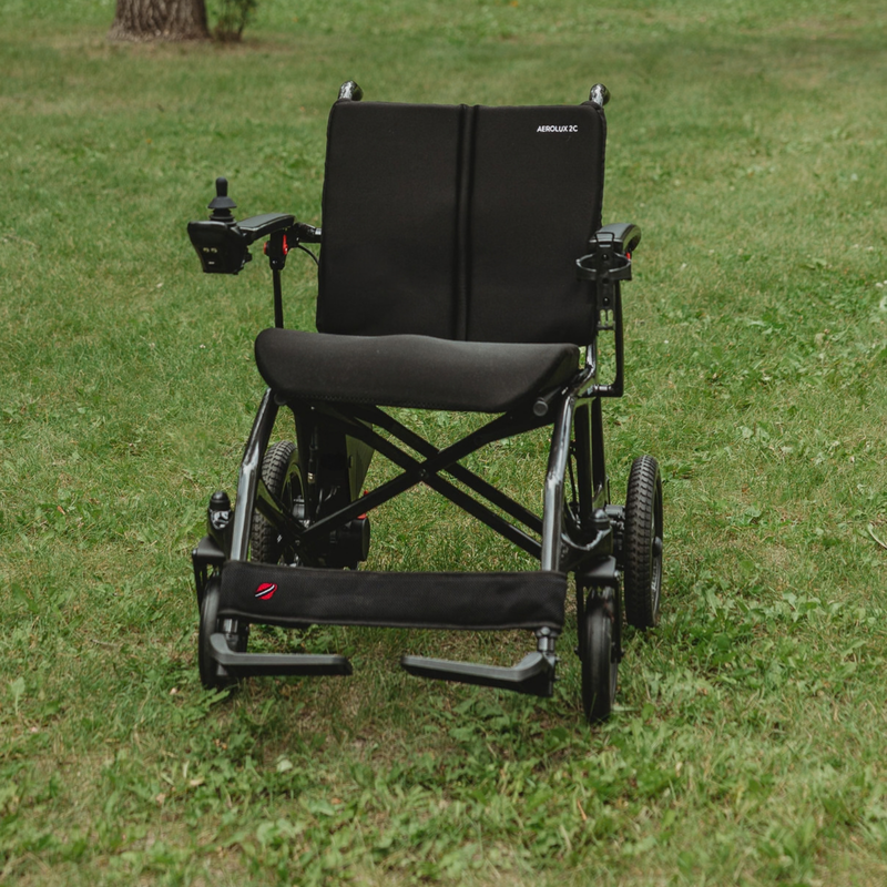 Travel Buggy Aerolux 2C folding power chair in everyday use
